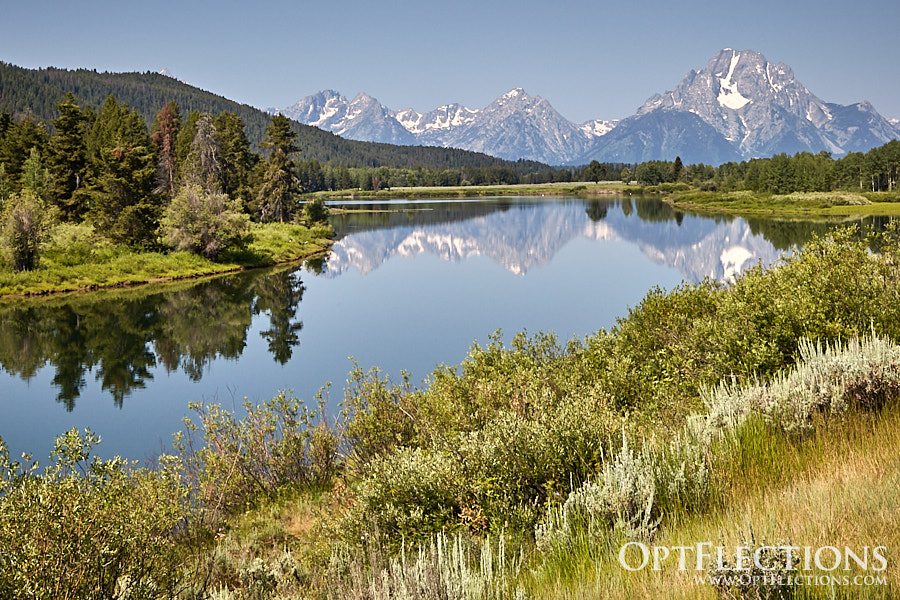 Tetons reflecting into the Snake River by Oxbow Bend