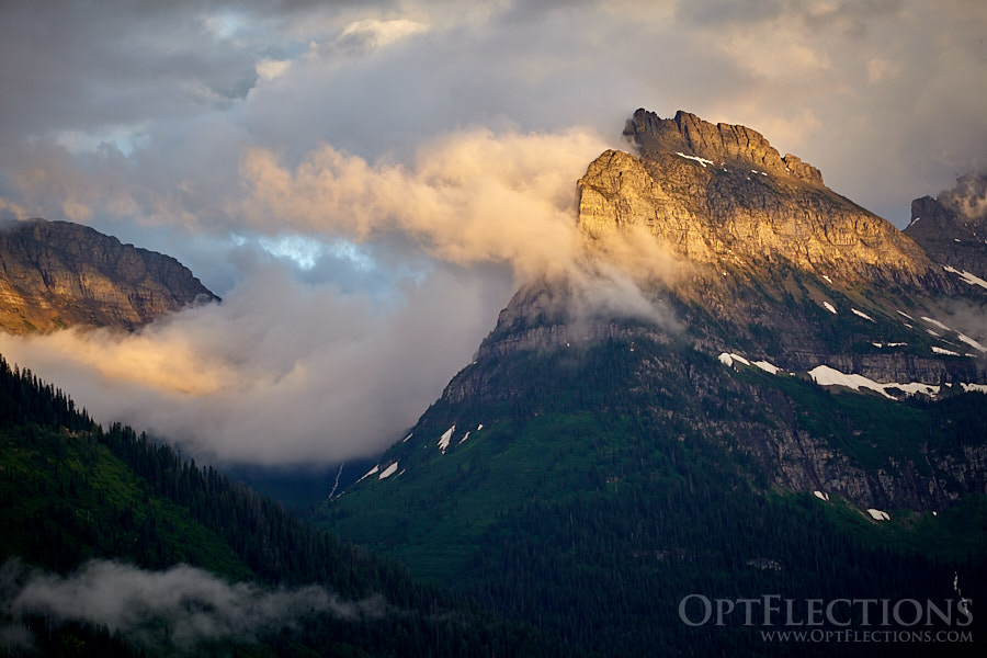 Sun filters through the valley on the Going-To-The-Sun Road